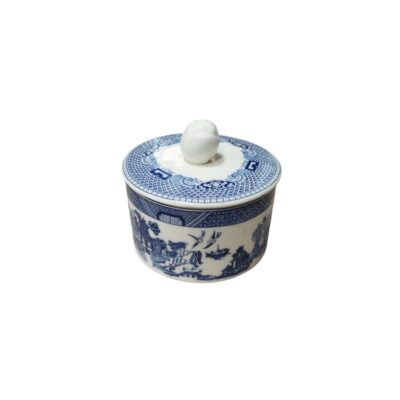 A small container with a glazed ceramic lid, characterised by its cylindrical design and intricate decoration in cobalt blue tones in an oriental style; available for hire for events, advertising, films and TV series