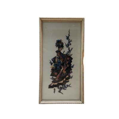 A framed artwork with a vertical rectangular design, featuring a three-dimensional or relief depiction of a traditional female figure in elaborate attire, accompanied by floral motifs; available for hire for events, advertising, films and TV series