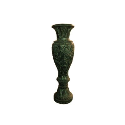 A decorative vase with a stylised design, characterised by intricate carvings featuring floral and geometric motifs along its body, neck and base, complemented by an aged patina finish in dark tones. Available for hire for events, advertising, films and TV series.