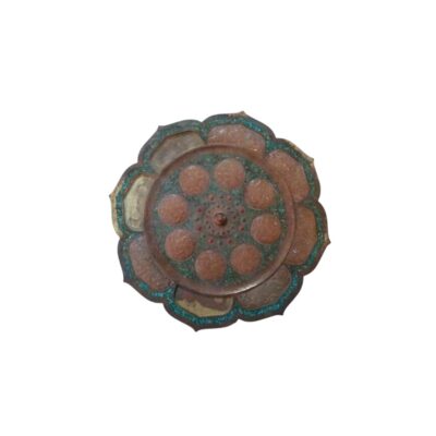 A circular, lobed metal object with an ornamental design reminiscent of a lotus flower; available for hire for events, advertising, films and TV series