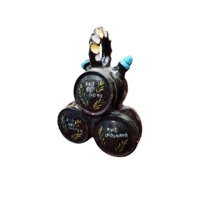 A ceramic vessel comprising multiple cylindrical sections arranged in the shape of interconnected barrels, with a dark glazed finish, a decorated top handle and spouts featuring light-coloured detailing; available for hire for events, advertising, films and TV series