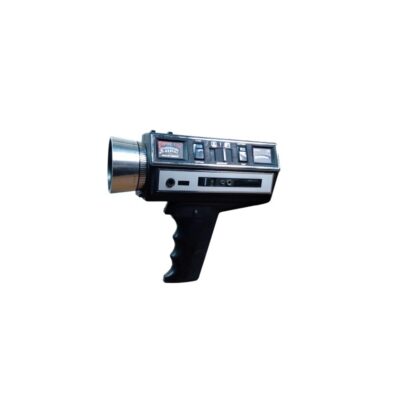 Vintage analogue film camera, characterised by its compact body in dark colours with top-mounted controls, indicator panels and an ergonomic vertical grip; available for hire for events, advertising, films and TV series