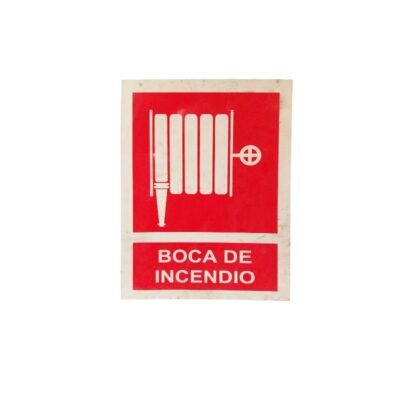 A rectangular, portrait-oriented sign featuring a red panel displaying the white silhouette of a fire hose or hose reel, accompanied by the inscription ‘BOCA DE INCENDIO’ in white lettering at the bottom; available for hire for events, advertising, films and TV series