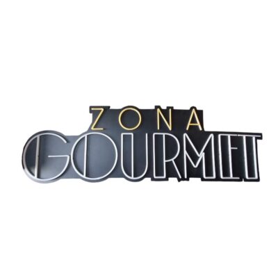 A cut-out sign with a modern and elegant design, featuring the word ‘ZONA’ at the top and ‘GOURMET’ in large letters outlined in a metallic or dark finish. It boasts a commercial, sophisticated and distinctive aesthetic that is very typical of signage for dining venues and markets – a cut-out sign with a modern and elegant design, featuring the word ‘ZONA’ at the top and ‘GOURMET’ in large letters outlined in a metallic or dark finish. It boasts a commercial, sophisticated and distinctive aesthetic that is very typical of signage for gastronomic venues, markets, event hire, advertising, films and TV series.