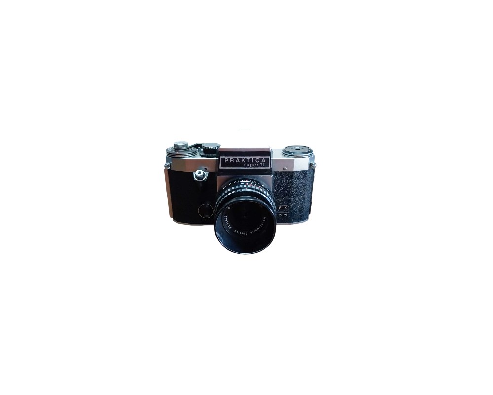 A vintage analogue SLR camera with a metal body and textured black finish, based on the iconic Praktica Super TL model, fitted with its original front lens; available for hire for events, advertising, films and TV series