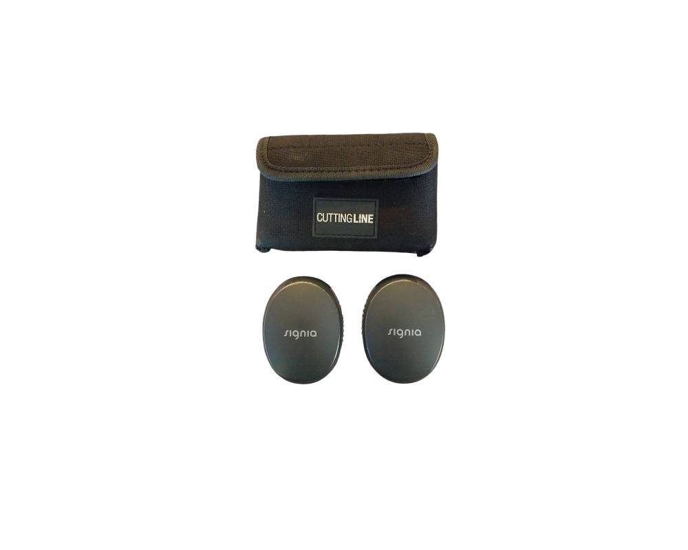 Signia brand hearing technology components, comprising two small, dark-coloured, oval-shaped devices or cases bearing the printed logo, and a technical fabric carrying case with a flap and a front label bearing the inscription ‘Cutting Line’ – available for hire for events, films and TV series