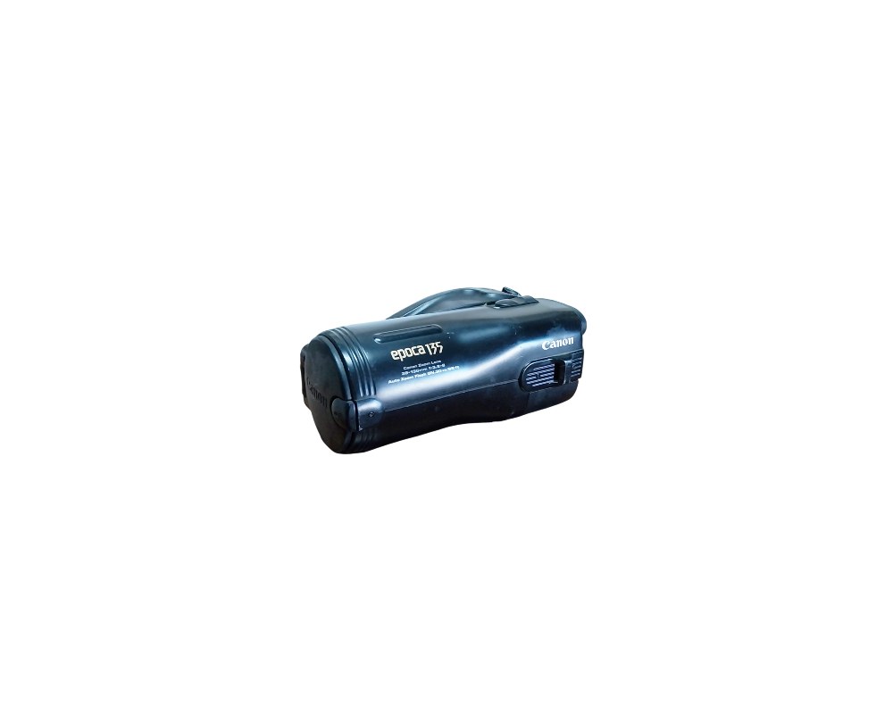 A vintage Canon compact camera, model Epoca 135, characterised by its ergonomic and streamlined design in black, featuring technical markings and an integrated grip; available for hire for events, advertising, films and TV series