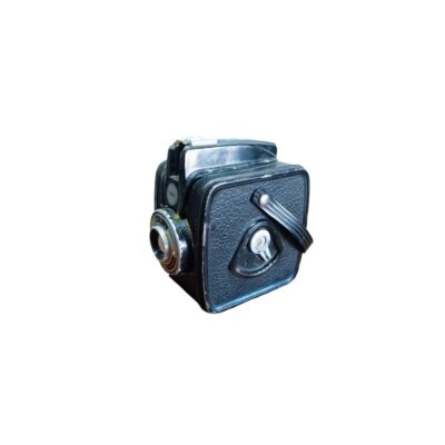 Vintage black box camera, characterised by its compact, cubic design with a textured finish, side-mounted lens and an integrated carrying strap; available for hire for events, advertising, films and TV series