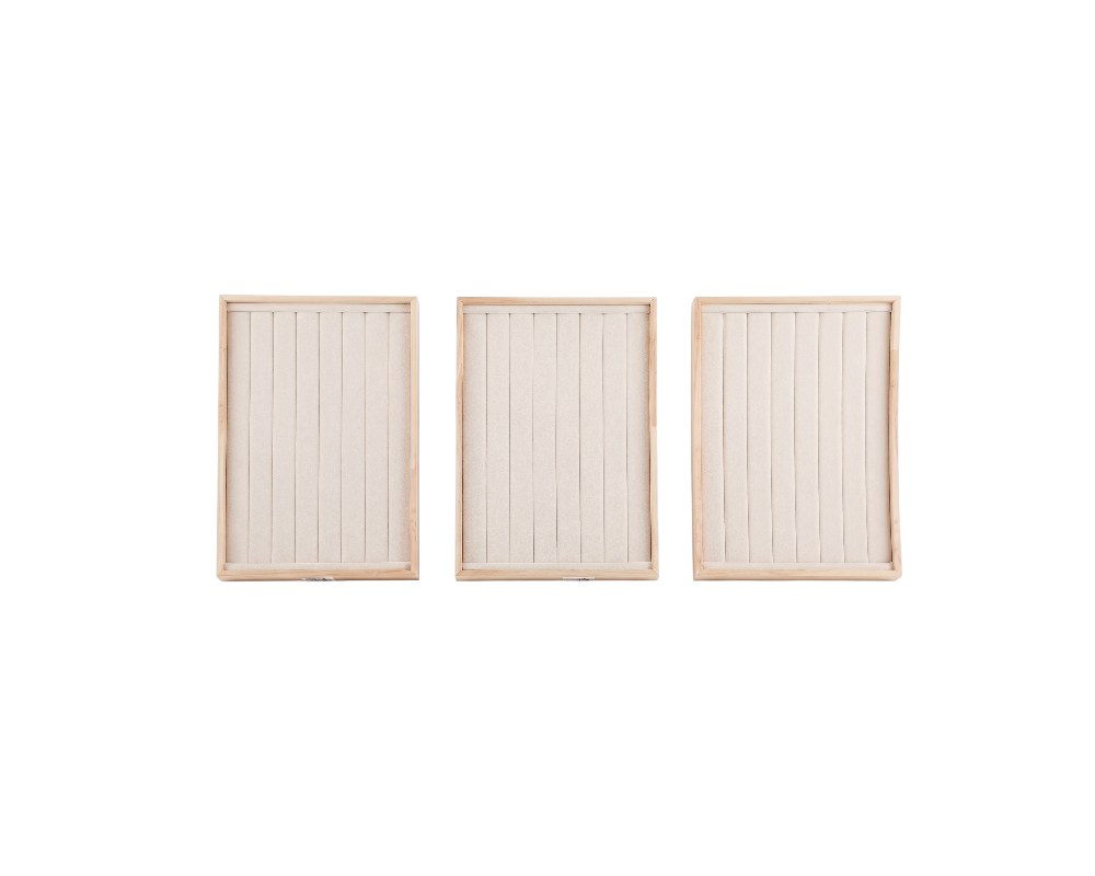 Set of three rectangular display trays, with a light-coloured wooden frame and an interior entirely lined with vertical slats covered in textured linen fabric; available for hire for events, advertising, films and TV series
