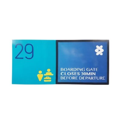 A rectangular information sign in a corporate and institutional style, divided into two colour sections in shades of turquoise and dark blue, displaying the number “29”, graphic icons of passengers and the text in English “BOARDING GATE CLOSES 30 MINUTES BEFORE DEPARTURE” Available for hire for events, advertising, films and TV series