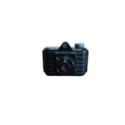 A classic analogue camera made from black bakelite with a ribbed design on the sides, an integrated top viewfinder and a protruding central lens; available for hire for events, advertising, films and TV series