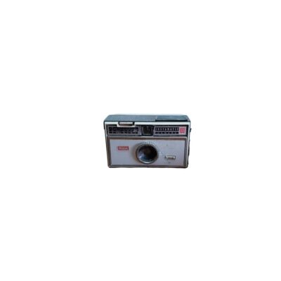 A classic analogue camera by Kodak, model Instamatic 104, characterised by its rectangular body with a metal front plate, the brand’s classic red logo and an integrated central lens; available for hire for events, advertising, films and TV series