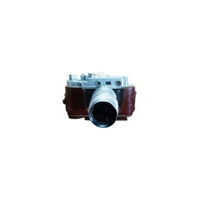 A classic analogue camera with a metal body, featuring a prominent front lens and protected by a vintage brown leather case; available for hire for events, advertising, films and TV series