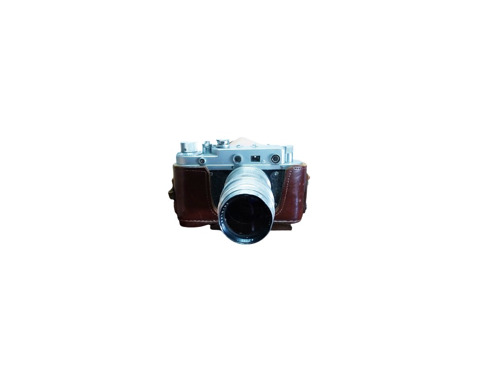 A classic analogue camera with a metal body, featuring a prominent front lens and protected by a vintage brown leather case; available for hire for events, advertising, films and TV series