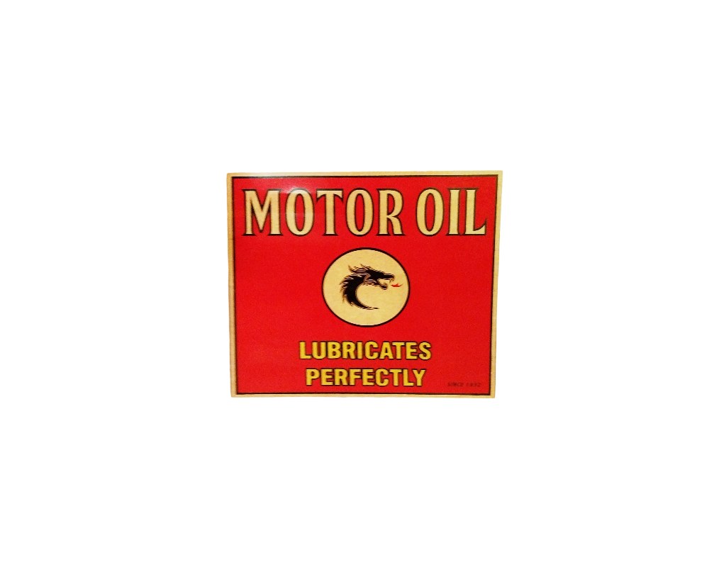 A rectangular sign in landscape format with a bright red background, highlighting the light-coloured lettering ‘MOTOR OIL’ and ‘LUBRICATES PERFECTLY’, accompanied by a central circular emblem featuring the silhouette of a dragon. It features an industrial, automotive and retro aesthetic very typical of vintage signage found in garages and petrol stations; available for hire for events, advertising, films and TV series.