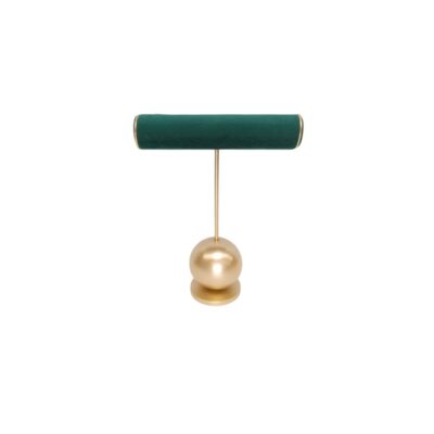 An elegant vertical display stand, comprising a horizontal upper cylinder upholstered in dark green velvet, supported by a slender metal frame resting on a flat, spherical base with a gold finish; available for hire for events, advertising, films and TV series