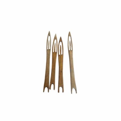 a set of handcrafted wooden shuttles, characterised by their pointed tip, elongated central eye and a notch at the base for collecting thread; available for hire for events, advertising, films and TV series