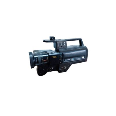 A professional video camera from Panasonic, characterised by its robust, industrially designed body in dark colours, an integrated top handle with controls and a large front lens with autofocus; available for hire for events, advertising, films and TV series